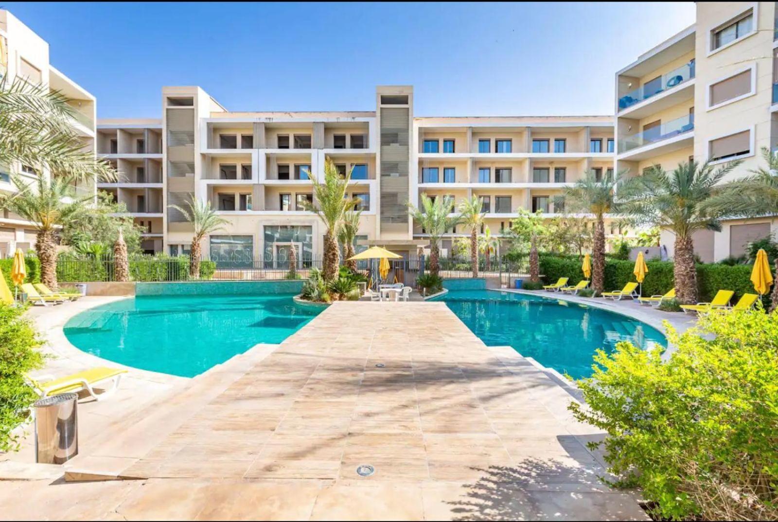 Appartement Luxueux Avec Piscine 10 Minutes Du Centre Ville Marrakesh Exterior foto